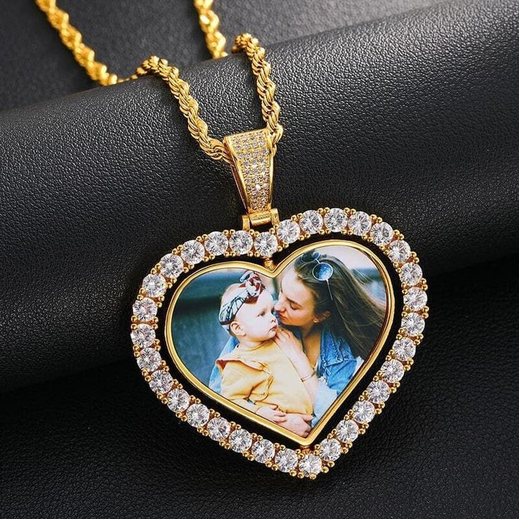 "Personalized Heart Photo Pendant, Picture Necklace, Rhinestone Double-Sided Rotating Charm, Silver and Gold, Mother's Day, Graduation gift Personalize this pendant with a photo of your partner, baby, parent, grandparent, children, friend, pet, or your wedding photo. Heart shaped pendant comes in gold-plated or silver-plated with artificial diamond rhinestones. Charm is a double-sided design and rotates to show image on both sides. Choose image and text, or image on each side.  Makes a great gift for an anniversary, birthday, Valentine's Day, Mother's Day, Father's Day, Christmas, engagement, graduation, wedding, in memory, or just because.  Add a matching silver-plated or gold-plated snake chain necklace with lobster clasp for an additional cost. Necklace measures 1.2mm wide and comes in Double Heart Rhinestone Jewelry For Anniversary, Heart Necklace With Rhinestones For Valentine's Day Anniversary, Valentine's Day Heart Necklace With Rhinestones For Anniversary, Valentine's Day Rhinestone Heart Necklace For Anniversary, Valentine's Day Gold Rhinestone Jewelry, Crystal Rhinestone Heart Necklace For Valentine's Day, Heart Necklace With Rhinestones For Gift, Valentine's Day Diamond Necklace With Rhinestones, Valentine's Day Double Heart Rhinestone Jewelry