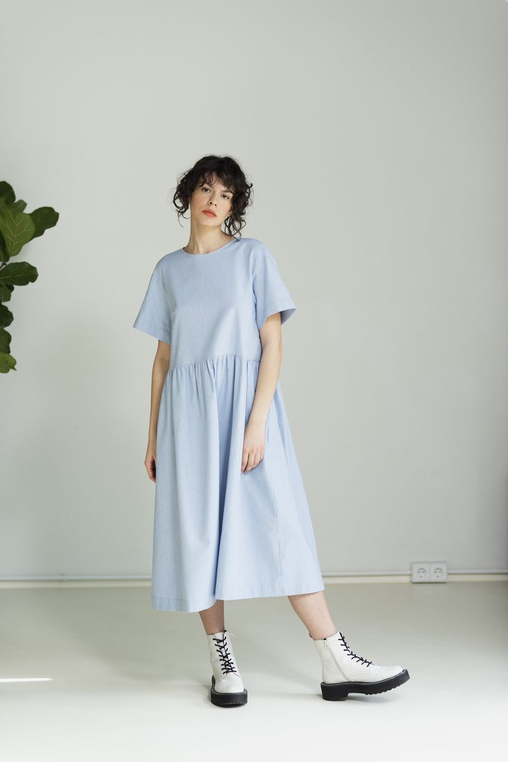 Feel the freedom of movement in this relaxed dress made from OEKO-TEX® certified cotton twill. This elegant, yet practical piece is elevated with dropped shoulders and side pockets. The exquisitely soft fabric, the oversize cut and the open back make the HIKKA Midi dress perfect for busy summer days.  Item: Handmade and made to order Materials: 100% cotton twill, OEKO-TEX® certified Style: Casual Fit: Relaxed Silhouette: A-Line Length: Midi Neckline: Boat Back: Open Pockets: Yes Sleeve length: Short Care: For best performance of the fabric we recommend hand wash or dry cleaning! Colors:  -Beige -Light Blue -Grey If you'd love to have this dress in a different color or size, we'd be happy to custom-make one for you.  Feel free to contact us at any time with questions and suggestions! We are Relaxed Fit Cotton A-line Maxi Dress, Cotton Maxi Dress With Short Sleeves For Daytime, Cotton Midi Dress With Short Sleeves For Daytime, Relaxed Fit Cotton Sundress, Flowy Cotton A-line Midi Dress, Oversized Cotton Summer Dress, Relaxed Fit Cotton Summer Maxi Dress, Cotton Relaxed Fit Sundress Midi Dress, Relaxed Fit Cotton Maxi Dress For Day Out