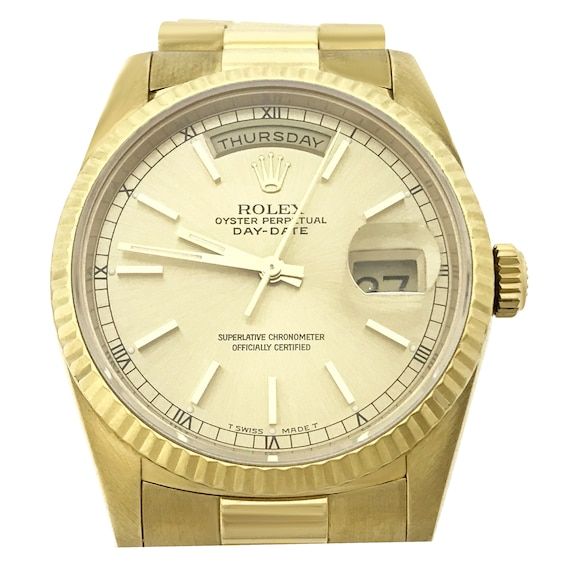 This Rolex Day-Date watch is a bespoke timepiece that provides class and distinction on every wrist. 36mm 18K yellow gold case Champagne dial with day-date window Fluted bezel The 18K yellow gold bracelet secures with a fold-over clasp Water-resistant Returns on ReKlaim products are only valid if the ReKlaim QR code is still affixed to the watch without alteration. Available online while supplies last. Previously Owned Rolex watches are not eligible for in-store pick-up. Previously Owned Rolex w Yellow Gold Watches With Subdials For Anniversary, Anniversary Yellow Gold Watches With Subdials, Timeless Gold Chronograph Watch With Chronometer, Gold Chronograph Watch With Chronometer, Timeless Style, Timeless Gold Chronograph Watch, Gold Chronograph Watch With Date Indicator For Formal Occasions, Luxury Gold Chronograph Watch With Date Display, Yellow Gold Chronometer Watch Accessories For Anniversary, Timeless Gold Watches With Date Indicator