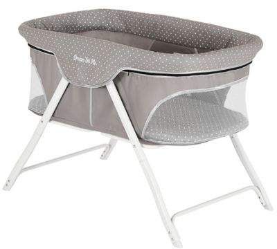 the baby bather is grey and white with polka dots on it's sides