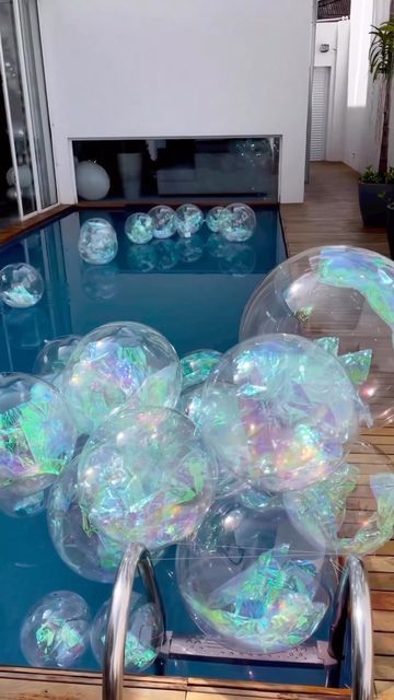 large bubbles floating on top of a glass table