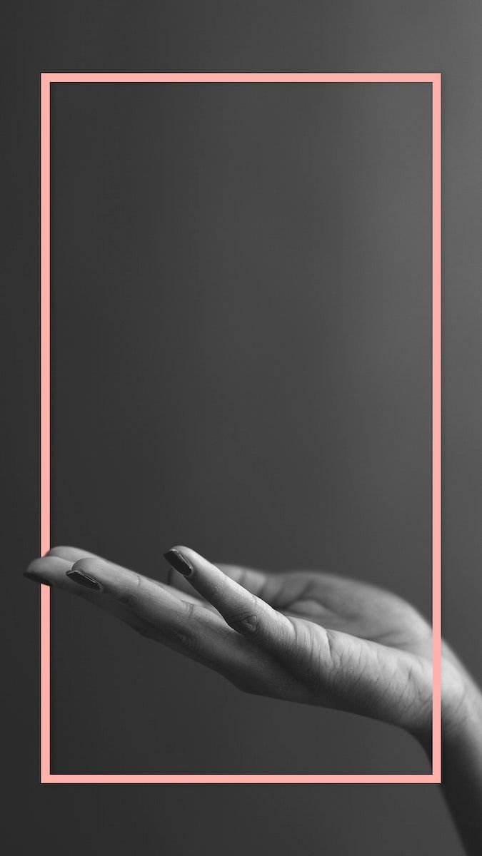 two hands holding each other in front of a pink square frame on a gray background