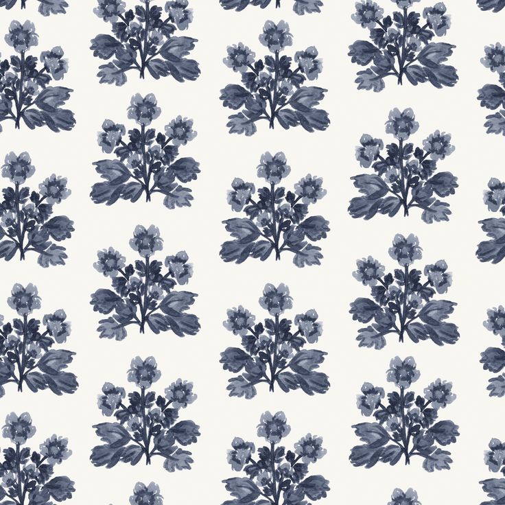 a blue and white wallpaper with flowers on it