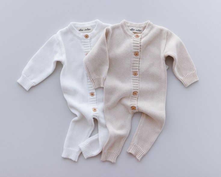 Bundle up your little one in style with our Long Sleeve Baby Knit Romper, perfect for the winter season. Crafted from high-quality cotton, this romper ensures maximum comfort and durability. Its long sleeves and legs provide extra warmth, making it ideal for chilly weather. Designed to be an heirloom piece, our romper showcases a timeless knit pattern that adds an elegant touch. Its gender-neutral design makes it versatile for any baby, while its soft fabric keeps them cozy and comfortable all d Beige Long Sleeve Cotton Onesie, Cream Long Sleeve Onesie For Loungewear, Winter Knitted Long Sleeve Onesie, Winter Long Sleeve Cotton Bodysuit, Winter White Loungewear Bodysuit, Beige Long Sleeve Onesie For Loungewear, White Cotton Winter Onesie, Cream Long Sleeve Onesie For Fall, White Long Sleeve Onesie For Fall