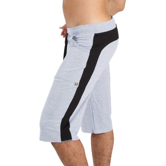 Knee Length Yoga Shorts Sporty Pants With Built-in Shorts, Gray Athleisure Bottoms With Built-in Shorts, Sporty Bermuda Bottoms With Built-in Shorts, Gray Yoga Bottoms With Built-in Shorts, Relaxed Fit Knee-length Sports Shorts, Gray Gym Bottoms With Elastic Waistband, Gray Bottoms With Elastic Waistband For Gym, Sporty Gym Pants Short Length, Sports Bottoms With Hip Pockets And Short Length