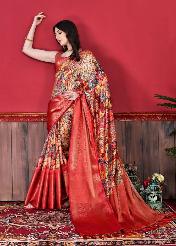 Introducing Pratibha Silk Collection Fabric Details: Saree: Experience the luxurious embrace of Soft Kanjivaram silk in our exquisite saree. Adorned with a captivating Kalamkari Digital Print that graces the entire fabric, this masterpiece also features a lavish Zari pallu and a skillfully woven Contrast border for a touch of elegance. Complete with a charming tassel attachment at the pallu end. Blouse: Complementing the saree, the ensemble includes a Brocade silk blouse piece, adding a perfect finishing touch to your ensemble. Elevate your style with the timeless beauty of Pratibha Silk. Brocade Pre-draped Saree For Diwali Puja, Multicolor Paithani Silk Pre-draped Saree For Navratri, Navratri Meenakari Tussar Silk Pre-draped Saree, Navratri Katan Silk Pre-draped Saree With Meenakari, Multicolor Tussar Silk Pre-draped Saree For Eid, Bollywood Style Multicolor Banarasi Silk Pre-draped Saree, Pre-draped Tussar Silk Saree With Meenakari For Festivals, Eid Multicolor Pre-draped Saree With Meenakari, Festive Multicolor Katan Silk Pre-draped Saree