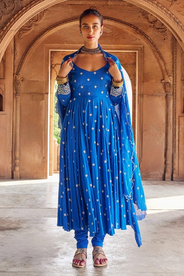 Electric blue anarkali with sequin embellished dori embroidered floral pattens. Comes with churidar and scalloped hem dupatta.
Components: 3
Pattern: Embroidered
Type Of Work: Sequin,Dori
Neckline: V-neck
Sleeve Type: Full
Fabric: Cotton Mul
Color: Blue
Other Details: 
Length: 
Anarkali: 50 inches
Churidar: 46 inches
Note: Kindly contact customer service for customization on sleeves and length at an additional charge
Occasion: Sangeet,Mehendi and Haldi - Aza Fashions Traditional Blue Maxi Length Lehenga, Blue Georgette Dress With Dori Work, Semi-stitched Royal Blue Bollywood Anarkali Set, Unstitched Blue Bollywood Dress, Blue Resham Embroidered Dresses For Navratri, Fitted Anarkali Salwar Kameez In Royal Blue, Blue Resham Embroidery Dresses For Navratri, Blue Dress With Dabka Work For Diwali, Fitted Blue Anarkali Set With Dupatta