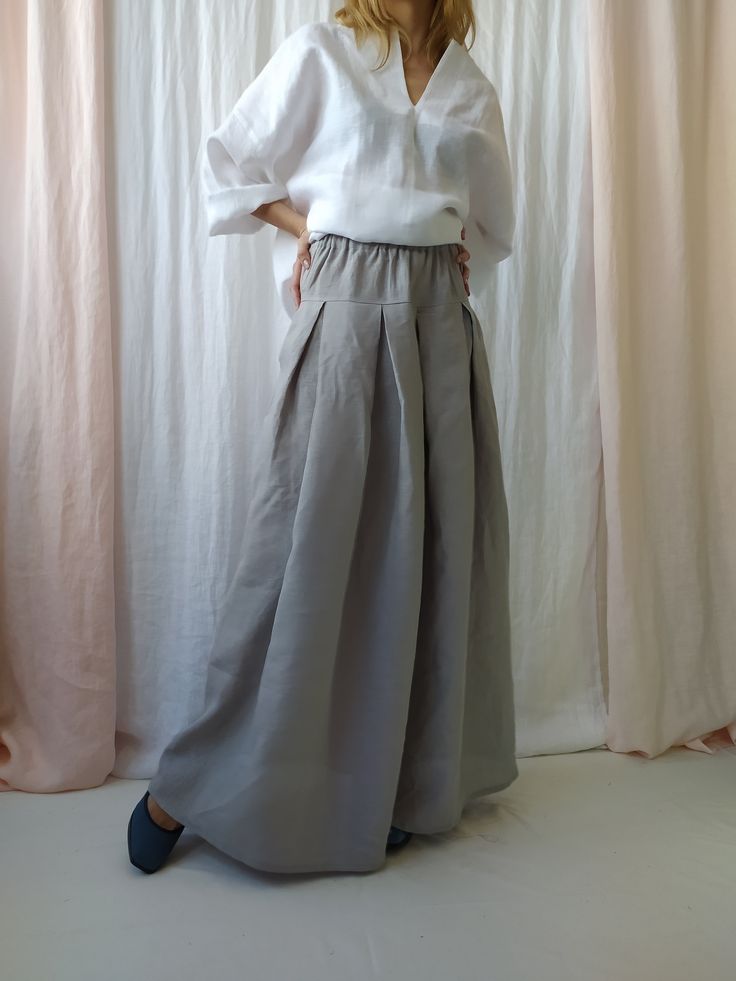 "Maxi linen skirt with pockets is perfect choice when you need casual, comfortable and stylish outfit combination. High waist linen skirt is clothing piece that can be easily paired with any top and creates a charming feminine look. Before placing an order, check the approximate measurements given below. If you are unsure about your size or would like to adjust the length of the item, you could leave your personal measurements (height, waist and hips) in a personalization box. SIZE and FIT Size Long Skirt With Pockets For Spring, Bohemian Bottoms With Side Pockets For Spring, Spring Bohemian Bottoms With Side Pockets, Spring Skirt Bottoms With Pockets, Spring Baggy Lined Maxi Skirt, Long Skirt With Side Pockets For Summer, Summer Long Skirt With Side Pockets, Spring Wide Leg Skirt With Side Pockets, Wide Leg Skirt With Side Pockets For Spring