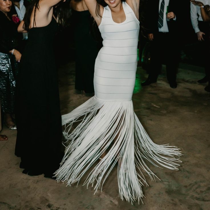 Worn Once As Second Wedding Dress. Such A Fun Dress For Our Destination Wedding Reception! The Fringe Is A Delight To Dance And Twirl The Night Away. Has Been Dry Cleaned. Top Seams Of The Straps Were Altered Slightly To Lift The Dress Up For My Small Cup Frame. (The Material Is Stretchy So We Slightly Tailored So That The Dress Wouldn’t Fall And Reveal My Bra) Description: Herve's Leger's Signature Seductive Styling And Striped Bodycon Silhouette Adds Eye-Catching Allure To This Maxi Dress. It Is Finished With Sweeping Fringe At The Hem Which Flutters About The Body With Each Step You Take. Bodycon White Dress, Second Wedding Dress, Sweeping Fringe, Destination Wedding Reception, Second Wedding, Herve Leger Dress, White Bodycon Dress, Fun Dress, Herve Leger