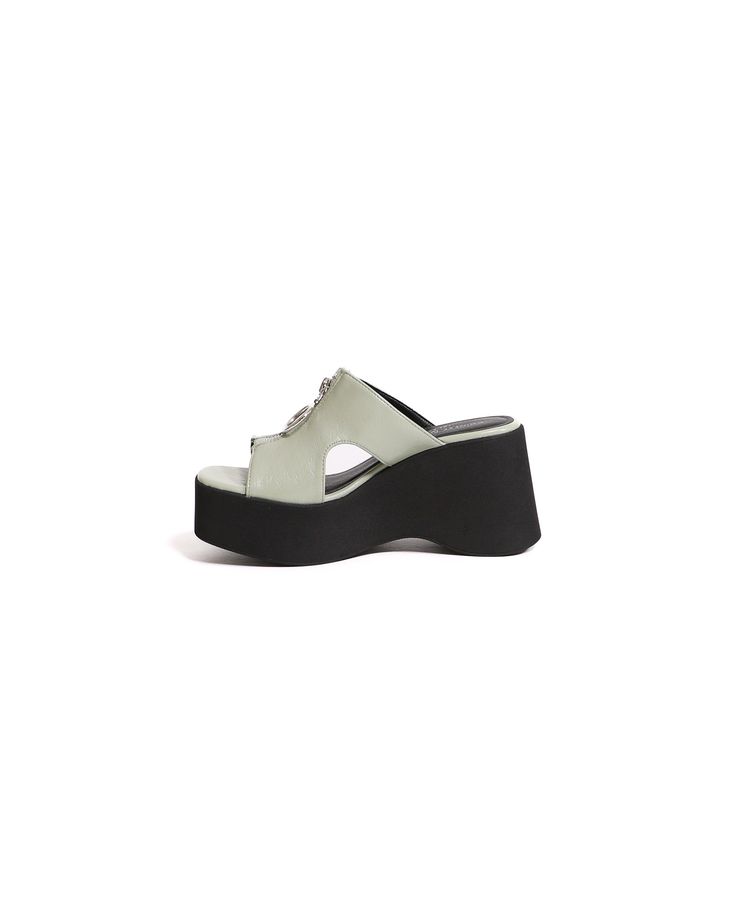 The Zip-Hop Platform Sandal is the perfect shoe for the fashion-forward woman who wants a stylish and comfortable shoe. The 3.5-inch platform wedge heel is modern and sexy, while the slip-on entry makes it easy to wear. The lightly padded footbed ensures hours of comfort, and the zipper detailing on the upper adds a touch of edgy appeal. Best of all, the Zip-Hop Platform Sandal is lightweight! Manmade Materials l 3.5" Platform Wedge l True to Size Modern Wedge Sandals For Spring, Spring Wedge Heel Platform Slippers With Heel Loop, Modern Platform Wedge Sandals For Spring, Modern High Heel Platform Wedge Sandals, Modern High Heel Wedge Sandals For Spring, Chic Wedge Heel Platform Sandals, Chic Sandals With Platform And Wedge Heel, Chic Slip-on Platform Sandals, Chic Platform Sandals With Wedge Heel