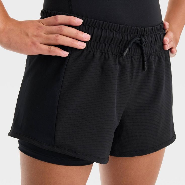 Why we're ALL IN: 2-in-1 shorts made with soft and stretchy fabric to help keep them comfortable through a range of activities, from running to sports practice and casual hangs. A full waistband elastic with drawcord closure makes for a stay-put fit, while a loose fit silhouette offers greater range of motion. All in Motion™: Made for every move, priced for every day. Functional Yoga Shorts With Elastic Waistband, Elastic Black Activewear For Training, Black Elastic Activewear For Training, Black Compression Athletic Shorts With Elastic Waistband, Elastic Moisture-wicking Workout Activewear, Moisture-wicking Elastic Activewear For Workout, Moisture-wicking Elastic Workout Activewear, Solid Athletic Shorts With Elastic Waistband For Training, Short Activewear For Running With Elastic Waistband