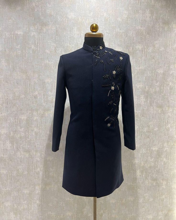 *2  Piece Navy blue :- Sherwani and Pant  *Fabric: %100 japanese , Thick, Warm,  Comfortable, Breathable, Softer, Satin Feeling *Center Hide Button Sherwani , With Zipper Fly Pants *This Suit Has A 6" Drop Which Is The Difference Between The Size Of The Sherwani & Pants. For Example, A 40r Jacket Includes A 34W Pant *Dry Clean Only Important Note: All Our Products Are Made To Order ! Please Contact Us For Perfect Fitting Suit. .Full Lining Indo-western  With Padding *We are proud to offer a wide Fitted Long Nehru Jacket With Floral Embroidery, Long Fitted Nehru Jacket With Floral Embroidery, Long Floral Embroidered Fitted Nehru Jacket, Elegant Floral Embroidered Kurta For Winter, Fitted Long Sleeve Bandhgala With Floral Embroidery, Fitted Floral Embroidery Sets With Stand Collar, Fitted Floral Embroidery Sets For Winter, Fitted Sets With Floral Embroidery And Stand Collar, Formal Nehru Jacket With Floral Embroidery And Straight Cut