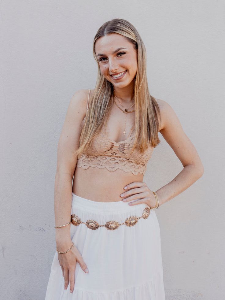 Catch the bohemian spirit and Southern California essence with our "Sunset Serenade Chain Belt." This piece is the perfect addition to take your outfit from simple to stunning with a nod to vintage charm. Fit: Adjustable chain for a customizable waist fit Style: Vintage-inspired, antique gold-tone conchos Occasion: Perfect for jazzing up a casual day look or adding flair to evening attire Styling Suggestions: Layer over a flowing maxi dress or cinch a billowy blouse for an effortlessly chic silh Bohemian Beige Jewelry For Spring, Beige Bohemian Jewelry For Spring, Summer Bohemian Jewelry With Delicate Chain, Bohemian Summer Jewelry With Delicate Chain, Bohemian Delicate Chain Jewelry For Summer, Billowy Blouse, Rehearsal Dinner Looks, White Rehearsal Dinner Dress, Socal Style