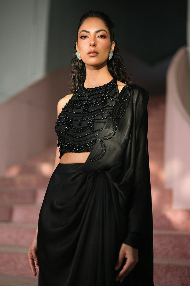 Yara Elegant Black Silk Pre-draped Saree, Elegant Silk Pre-draped Saree For Festive Occasions, Elegant Floor-length Pre-draped Saree With Unstitched Blouse, Elegant Blouse Piece With Cape Sleeves For Festive Occasions, Hand Embellished Silk Pre-draped Saree, Elegant Party Pre-draped Saree With Zari Work, Elegant Festive Blouse Piece With Cape Sleeves, Elegant Floor-length Embellished Blouse, Elegant Festive Saree With Draped Sleeves