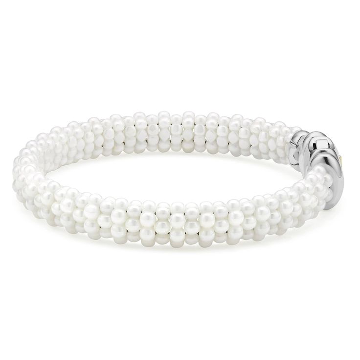 A white ceramic Caviar bracelet that is finished with a sterling silver box clasp. White Gold Pearl Bracelets With Round Beads, Luxury Pearl White Beaded Bracelets, Luxury White Beaded Pearl Bracelet, Luxury Pearl White Bracelets With Round Beads, Classic White Beaded Stretch Bracelet, Elegant White Jewelry With 8mm Beads, Formal White Jewelry With 8mm Beads, Formal White Pearl Beaded Bracelets, Elegant White Stretch Bracelet With 8mm Beads