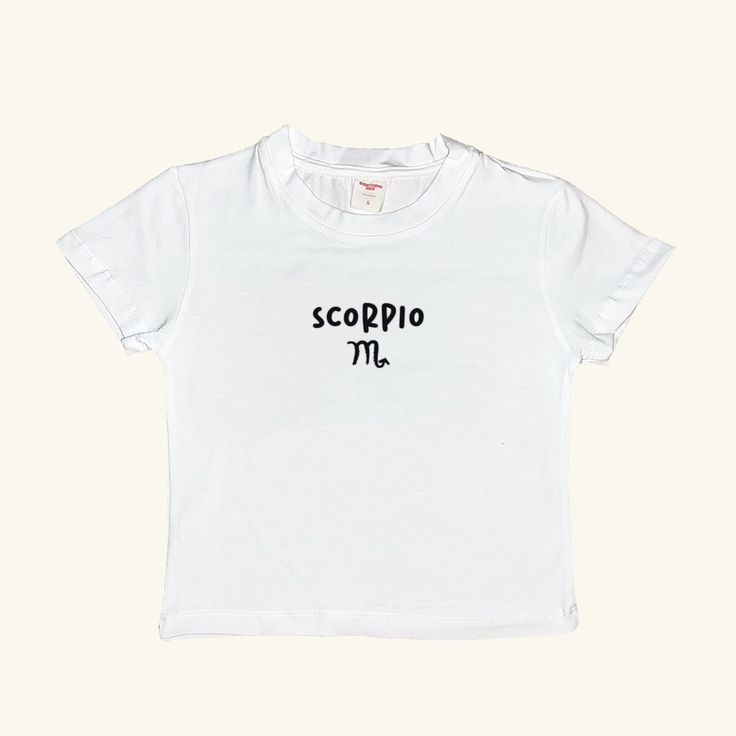 Elevate your summer wardrobe with our special collection of minimal and stylish Signs Baby Tees. This white tee, featuring the Scorpio, offers a perfect blend of comfort and style, making it an essential piece for everyday outfits. It's minimal design and basic fit ensure it pairs effortlessly with any look. This unique collection celebrates the signs, making it a thoughtful gift or a personal treat. Don't miss out on the other designs in this collection! Visit our shop, Minel, to explore all the collections and find your perfect match. Material: 80% Cotton 20% Lycra Basic Short Sleeve T-shirt For Summer, Basic Summer T-shirt, Unisex Organic Cotton T-shirt For Summer, White Print T-shirt For Summer, Minimalist Crew Neck T-shirt For Summer, Basic White T-shirt For Everyday, Organic Cotton T-shirt For Everyday Summer Wear, Basic Style Summer T-shirt For Everyday, Summer Everyday T-shirt