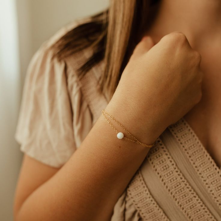 Milk + Honey Elegant Adjustable Bracelets With Pearl Pendant, Elegant Adjustable Bracelet With Pearl Pendant, Minimalist Pearl Jewelry With Oyster Bracelet, Dainty Pearl Drop Jewelry, Dainty Pearl Drop Bracelet, Minimalist Everyday Jewelry With Pearl Charm, Dainty Everyday Pearl Charm Jewelry, Adjustable Everyday Pearl Chain Jewelry, Pearl White Bracelet With Pearl Chain