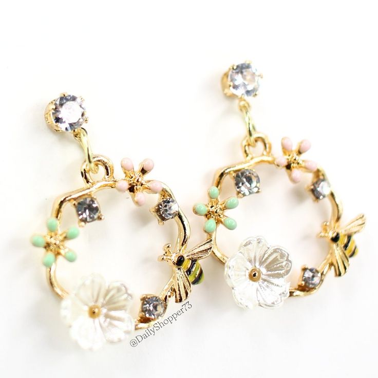 These Are A Brand New Set Of Whimsical Pastel Floral Bee Gold Tone Dangle Drop Stud Earrings. These Stunning Earrings Feature Pastel Green And Pink Enamel Petal Gold Tone Flowers, A Pearly White Acrylic Flower, Round Cut Glass Clear Rhinestones, And A Black And Yellow Enamel Bee On A Gold Tone Metal Circle Dangle On A Stud With A Round Cut Glass Rhinestone. This Is The Perfect Dainty Floral Addition To Your Wardrobe! All Orders Are Packaged With And Are Shipped Out Asap! Questions? Leave Us A Co Pastel Green And Pink, Fairytale Jewelry, Fairy Tale Jewelry, Acrylic Flower, Metal Circle, Acrylic Flowers, Pink Enamel, Pastel Floral, White Acrylic