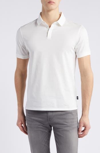 Classic and comfortable, this jersey polo made from soft cotton is always a great choice for everyday and keeps you looking as good as you feel. Button half placket Spread collar Short sleeves 100% cotton Dry clean Imported Classic White Cotton Polo Shirt, White Cotton Polo Shirt With Ribbed Collar, White Polo Shirt With Johnny Collar, White Johnny Collar Polo Shirt, White Johnny Collar Polo Shirt With Placket, White Cotton Polo Shirt With Polo Collar, White Cotton Collared Polo Shirt, White Cotton T-shirt With Button Closure, White Casual Polo Shirt With Seamless Collar