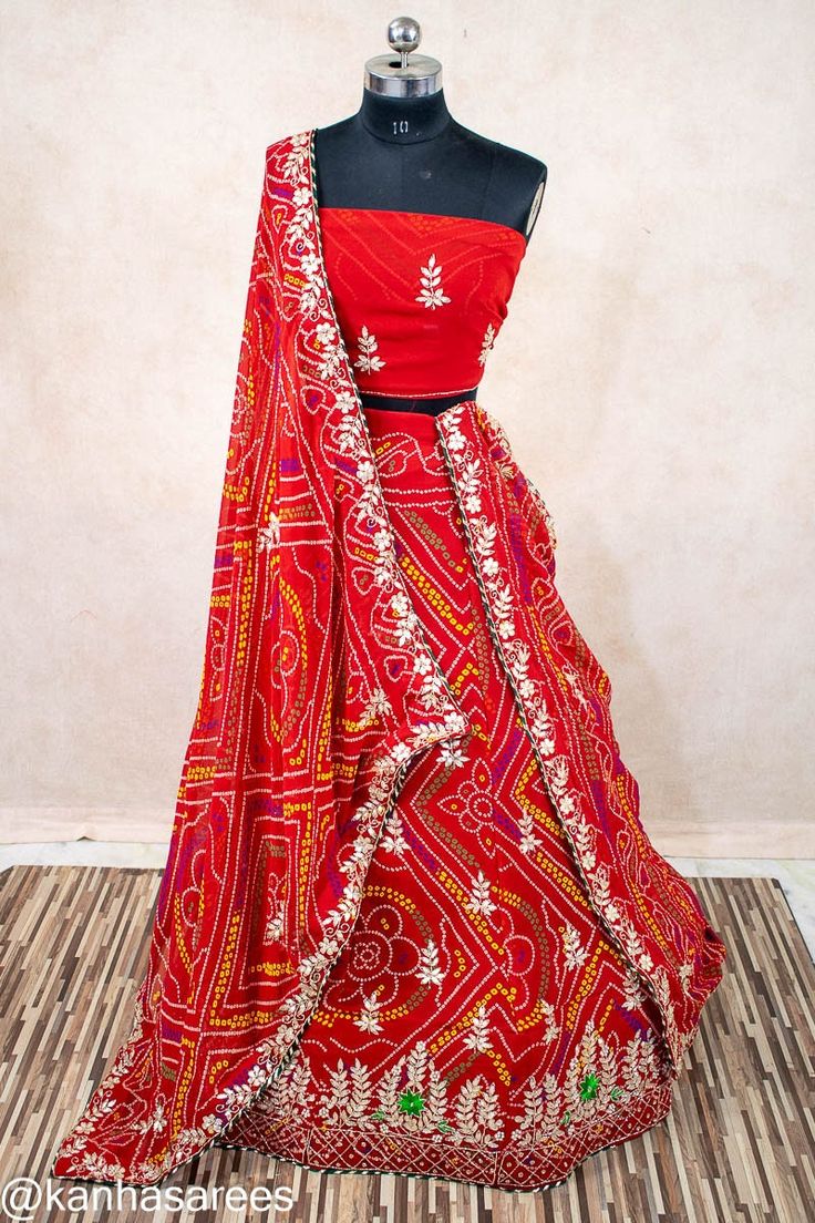 Bandhani Gotapatti Indian Wedding Lehenga Choli with Dupatta Immerse in the splendor of Indian heritage with this Bandhani Gotapatti Lehenga Skirt, a paragon of Rajasthani craftsmanship. Perfect for weddings and traditional ceremonies, this skirt is a celebration of culture and artistry. 🌹 Size can be customized also. This size fits upt  42 length and 42 waist.  When you place order please write length and waist size in customization box. So we will alter it and send to you. For further customization contact us in message inbox. Authentic Bandhani Design: Delicately tied and dyed by artisans, each pattern tells a story of heritage. Elegant Gotapatti Detailing: Embellished with the celebrated Rajasthani Gotapatti work for a regal touch. Perfect for Wedding Festivities: Be the belle of the Gotapatti Lehenga, Indian Wedding Dress Traditional, Bandhani Design, Gotapatti Work, Bandhani Lehenga, Rajasthani Dress, Indian Wedding Lehenga, Wedding Festivities, Bridal Skirts