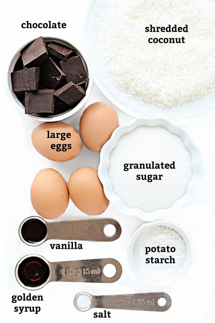 ingredients to make chocolate eggs laid out on a table