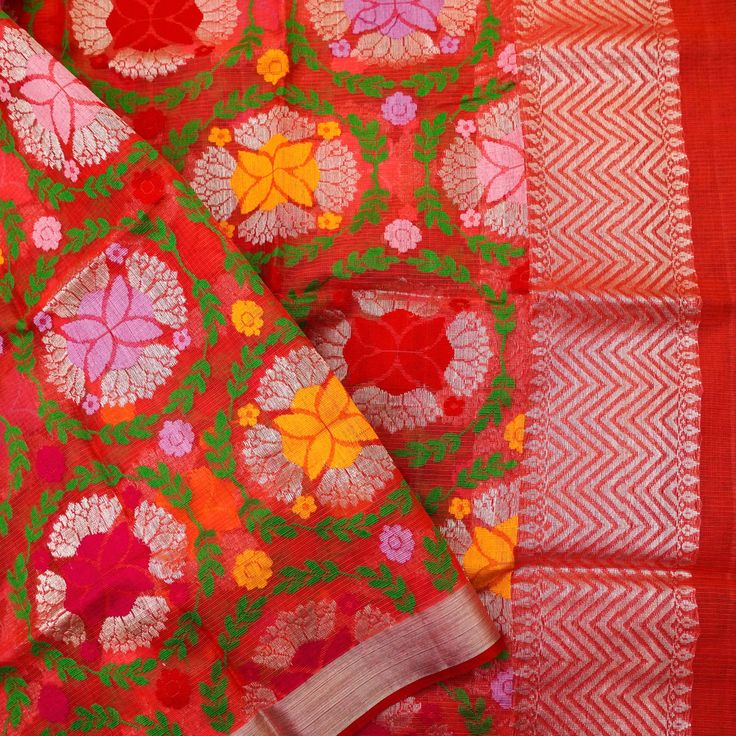 Kota Doria or Kota Doriya is the name of a lightweight fabric made of tiny woven squares (khat) which is still handwoven on traditional pit looms in Kaithoon near Kota in Rajasthan and in some of the surrounding villages. Kota Doriya Sarees are made of pure cotton and silk and have square like patterns known as khats on them. The chequered weave of a Kota sari is very popular. They are very fine weaves and weigh very less. Fabric - Pure Kota Silk with Real Zari Color -Pink Note- There may be sli Chanderi Traditional Wear With Traditional Patterns For Rituals, Traditional Fabric For Festive Occasions, Multicolor Saree With Zari Weaving For Rituals, Traditional Fabric With Motifs For Festive Season, Festive Traditional Fabric With Pallu, Traditional Fabric For Puja And Festivals, Multicolor Embroidered Traditional Wear For Puja, Folk Traditional Wear With Woven Motifs For Ceremonies, Folk Traditional Wear For Ceremonies With Woven Motifs