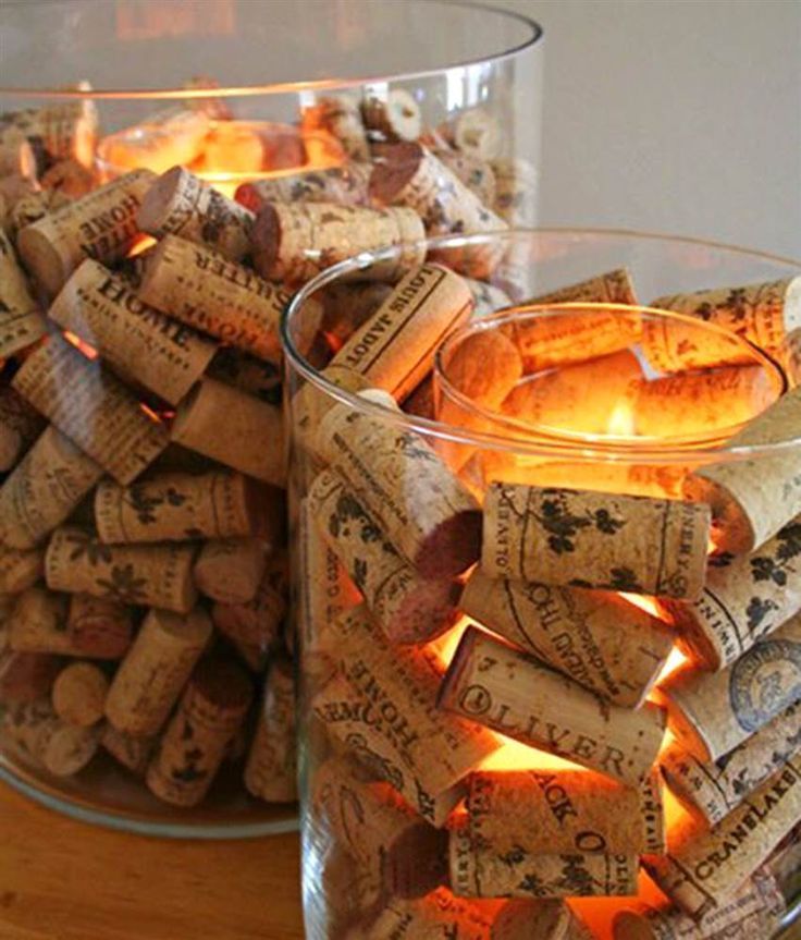 two glass bowls filled with wine corks