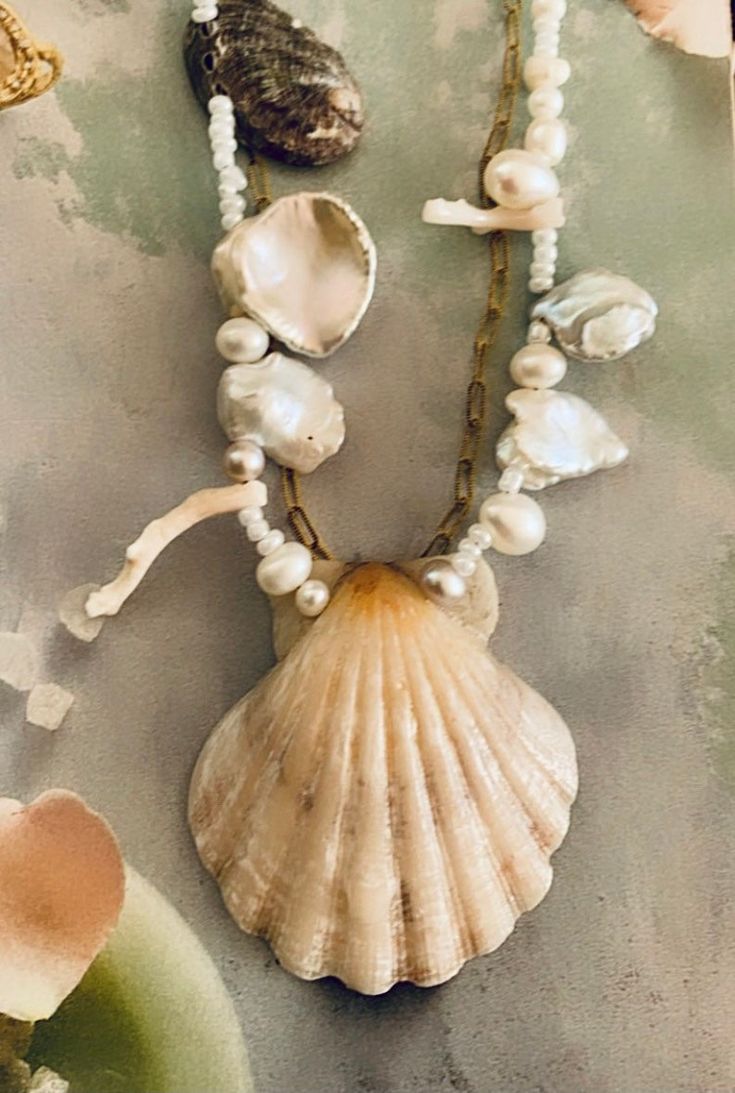 Elegant Beach Pearl Shell Pendant, Elegant Pearl Pendant Shell For Beach, Ocean-inspired Pearl Pendant Jewelry, Ocean-inspired Shell Necklace With Pearl Charm, Bohemian Baroque Pearl Jewelry As Gift, Bohemian Baroque Pearl Jewelry For Gift, Bohemian Baroque Pearl Jewelry Gift, Beach Baroque Pearl Jewelry With Pearl Charm, Ocean-inspired Pearl Shell With Pearl Drop