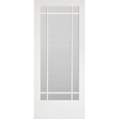 a white door with glass panels on the top and bottom panel, in front of a white background