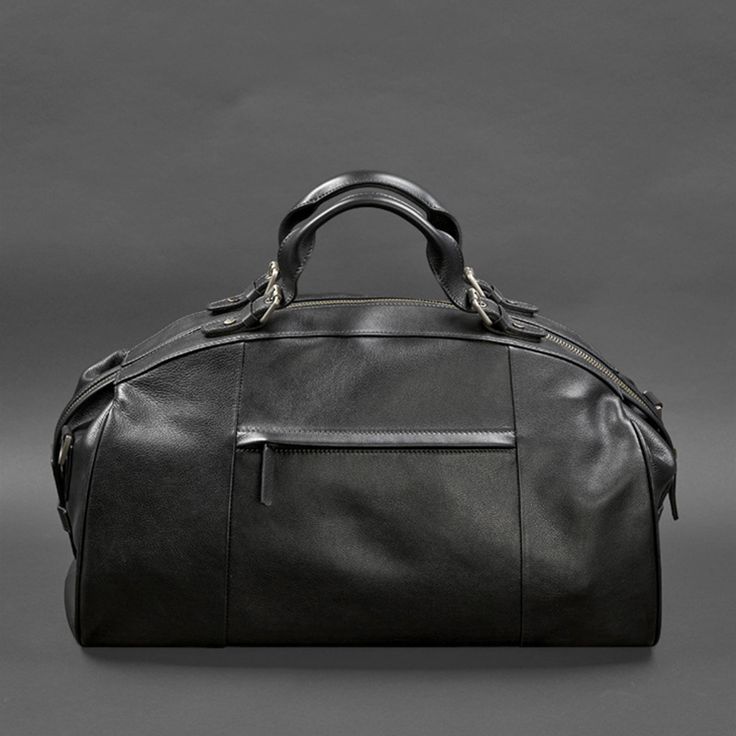 A leather travel bag is a comfortable and roomy model that will allow you to take everything you need with you on a business trip or a short trip.   Key Features:    The bag is made of smooth genuine leather of premium quality. Strong textile lining inside. The accessory closes with a zipper, which is fixed with whips. The bag has one roomy compartment and several pockets for small items.  The bag has comfortable leather handles. The set includes a removable wide shoulder strap.  The bottom is p Luxury Satchel Weekender Bag For Travel, Luxury Weekender Satchel Bag For Travel, Luxury Leather Lined Duffle Bag For Travel, Leather Shoulder Bag For Business Trips, Luxury Leather-lined Duffle Bag For Travel, Luxury Travel Duffle Bag With Leather Lining, Luxury Weekender Bag With Luggage Sleeve For Travel, Leather Travel Accessories With Leather Handles, Leather Satchel Travel Accessories