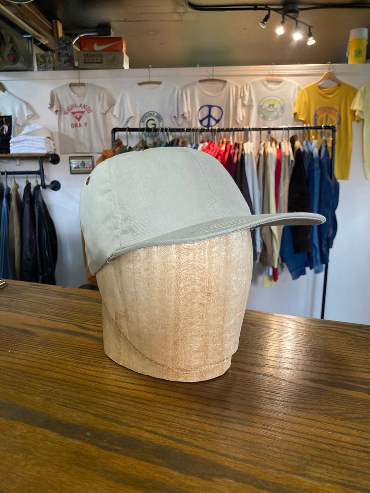 "Deadstock vintage 1960s twill khaki fitted baseball cap. Cotton. multiple sizes available, please specify size at checkout. - - - - - - - - - - - - - - - - - - - - - - - - - - - - - - - - - - - - - - - -  INTERNATIONAL SHIPPING AVAILABLE UPON REQUEST Craft Union does NOT accept returns or exchanges, all items are FINAL SALE Please consider the following prior to placing an order : Because measurements are provided, Craft Union does NOT grant refund/exchange requests if an item does not fit. We are always happy to assist interest buyers with any size/fit concerns using the \"ask a question/message\" feature! Most vintage & antique items are rarely found in new/unused condition, visible age and wear often adds to their value and desirability so imperfections of all kinds are to be expected. Vintage Khaki Baseball Cap, Vintage Khaki Hats With Curved Brim, Vintage Cotton Adjustable Baseball Cap, Vintage Cap Hat For Everyday, Vintage Cap For Everyday, Vintage Cap For Everyday Wear, Vintage Adjustable Khaki Hat, Vintage Khaki Cap, Vintage Dad Hat For Everyday