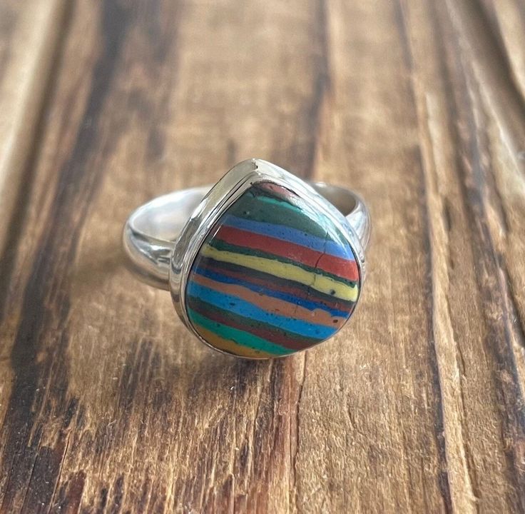 "Rainbow Calsilica Sterling Silver Ring US Size 8 Rainbow Calsilica was mined in Mexico and is 13x13mm Top of ring is 5/8\" by 5/8\" 4.6g Sterling Silver, stamped 925 *Check out my shop for one of a kind, handmade pieces that feature genuine gemstones and Sterling Silver. I love to work with unique rare gems mined in the US to support American Miners. I personally hand pick each and every single stone used in my designs. *I have been in the jewelry business for over twenty years and enjoy the pr Customer Gifts, Gem Mining, Natural Stone Jewelry, Rare Gems, Creating Jewelry, Single Stone, Labradorite Ring, Jewelry Business, Gemstone Colors