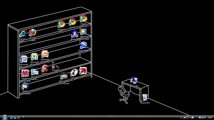 an image of a computer screen with various icons on the monitor and in front of it is a black background