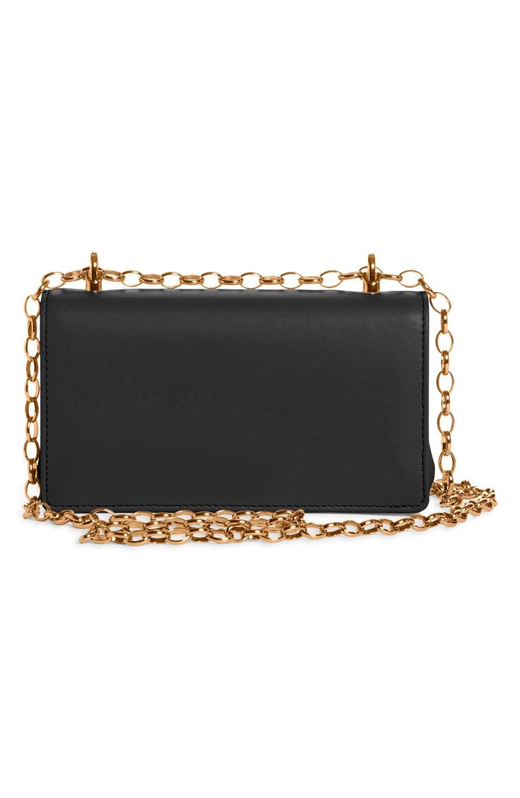 A D&G logo with baroque-inspired gilt flourishes ornately brands this compact leather bag designed with a sliding chain strap that can be worn doubled or long. Style Name:Dolce&gabbana Girls Logo Leather Phone Crossbody Bag. Style Number: 6164781. Black Wallet On Chain With Gold-tone Logo For Evening, Chic Wallet On Chain With Gold-tone Logo For Everyday, Luxury Black Wallet On Chain With Gold-tone Logo, Black Wallet On Chain With Gold-tone Logo Plaque, Black Wallet On Chain With Gold-tone Logo, Classic Clutch Bag With Gold-tone Logo Plaque, Formal Black Wallet On Chain With Gold-tone Logo, Everyday Leather Wallet On Chain With Gold-tone Logo, Leather Wallet On Chain With Gold-tone Logo