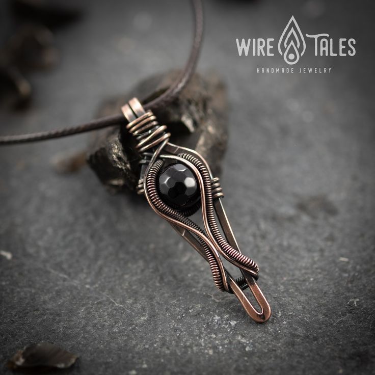 Wire wrapped bohemian style copper necklace pendant with natural black Onyx gemstone. Copper was oxidized to create antique look and to highlight the details of the wire work. It is a unisex necklace so it fits both men and women. This copper necklace comes with brown waxed cotton cord which has adjustable sliding knot and it can easily be adjusted to your preferred length ( approximately from 12 to 28 Inches). This necklace was made out of natural copper wire, so it is going to get darker over Black Hand Wrapped Necklace For Gift, Hand Wrapped Black Necklace For Gift, Black Copper Bohemian Necklaces, Black Bohemian Hand Wrapped Jewelry, Black Bohemian Copper Necklace, Black Bohemian Hand-wrapped Jewelry, Bohemian Black Hand Wrapped Jewelry, Bohemian Black Copper Necklace, Black Wire Wrapped Necklaces For Jewelry Making