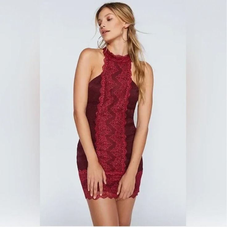 New $250 Free People Natasha Lace Halter Bodycon Mini Dress Party Wine Red M Size Medium New With Tag Holder Attached Delicate Lace Elevates This Simplistic Bodycon, Perfect For A Night Out. Fit: This Style Fits True To Size. - Sleeveless - Hidden Side Zip Closure - Lace Detail Shell: 92% Nylon, 8% Spandex Trim: 90% Nylon, 10% Spandex Lining: 70% Rayon, 25% Nylon, 5% Spandex Side Zipper Entry Fully Lined Approximate Measurements- Flat Lay: Pit To Pit 17” Length 33” Waist 15” Fitted Red Mini Dress For Holiday Party, Burgundy Bodycon Dress For Party, Red Mini Bodycon Dress For Holidays, Sleeveless Bodycon Dress For Date Night And Holiday, Burgundy Bodycon Party Dress, Burgundy Mini Dress For Date Night Holiday, Holiday Red Bodycon Dress For Date Night, Chic Red Bodycon Dress For The Holidays, Fitted Burgundy Mini Dress For Holidays