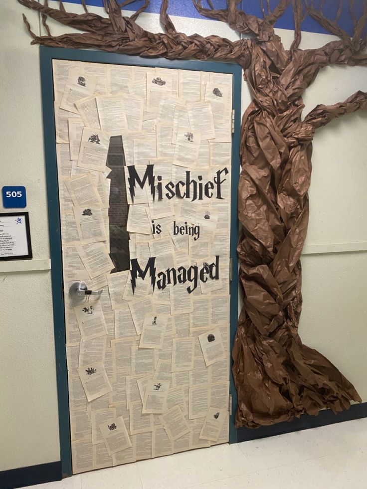 a bulletin board with the words misshef is being managed in front of a tree