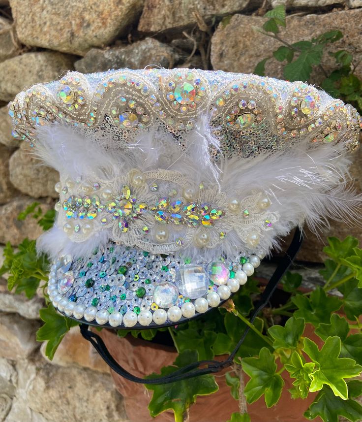 Fabulous sequin and Pearl military hat perfect for weddings,festivities and party's . Hand decorated with Ab crystals and a lace motif . Made to order in your size so please forward your head size in cm with each order. Delivery time 4- 5 weeks  Gems and motifs May vary slightly depending on stock levels . We can also add any other sequin colours to the brim to match your outfit or accessories 😀 Festival Hat, Military Hat, Costume Hats, Colour Combination, Your Outfit, Bob Wigs, Hand Decorated, Costume Accessories, Festival Captain Hat