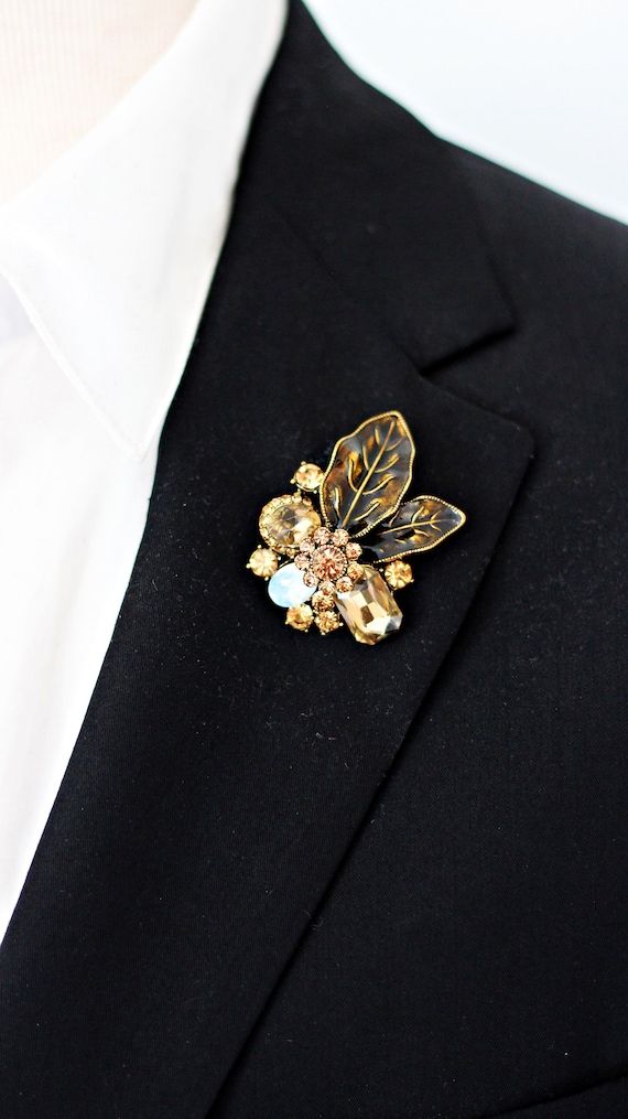 Check out this item in my Etsy shop https://www.etsy.com/listing/1190820774/small-leaf-flower-steampunk-copper Brooch For Men Suit, Lapel Pins Mens Wedding, Lapel Pin, Men Wedding Flower Pin, Gold Flower Lapel Pin, Formal Flower Lapel Pin, Brooch Boutonniere, Flower Lapel Pin Men, Lapel Pins Suit