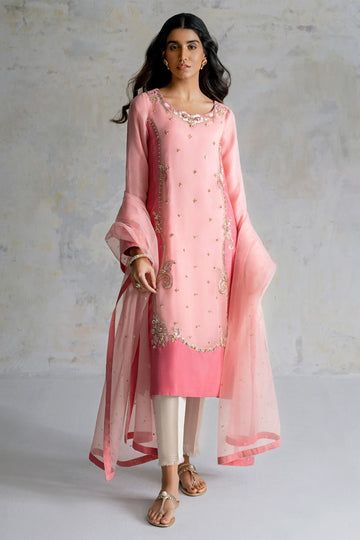 The pink Kameez Trouser Dupatta Pakistani Wedding Dress is a stunning masterpiece in premium Raw Silk fabric. This Pakistani Dress is available Online. Raw Silk Lawn Suit With Zari Work For Receptions, Pink Tissue Silk Salwar Kameez With Resham Embroidery, Pink Tissue Silk Salwar Kameez With Traditional Drape, Unstitched Silk Lawn Suit For Reception, Raw Silk Unstitched Suit For Eid Reception, Traditional Organza Lawn Suit For Weddings, Hand Embellished Raw Silk Gown For Eid, Elegant Silk Lawn Suit For Reception, Hand-embellished Raw Silk Gown For Eid