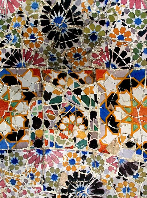 colorful tiles are arranged in an intricate pattern