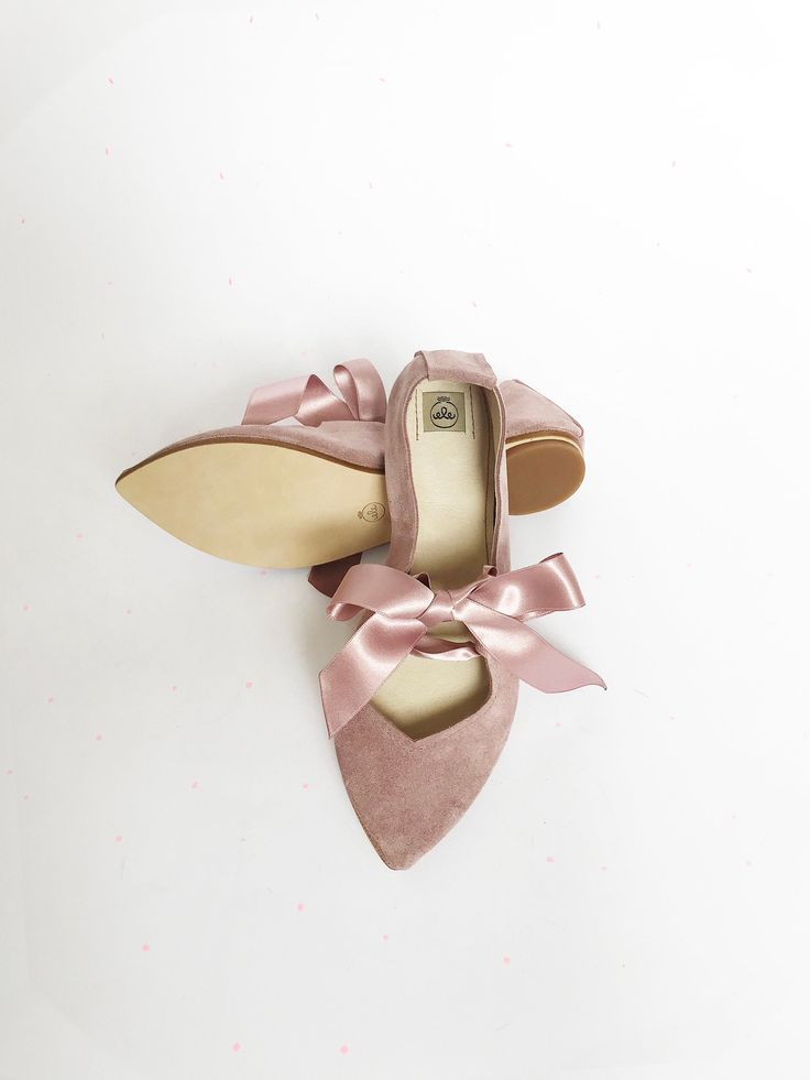 "These beautiful leather ballet flats are really so soft and elegant, whether you will have them as bridal shoes on your Wedding day, or as everyday favourite flats, these beautiful shoes will make you feel so special! ► Handmade to order ballet flats, I will be delighted to personally handcraft a pair especially for you! ► Upper in buttery soft Pink Blush Italian leather suede ► Satin ribbon closure ► Available in many wonderful colors, see them all here : https://www.etsy.com/shop/elehandmade Elegant Bridesmaid Pointed Toe Flats, Elegant Closed Toe Bridesmaid Flats, Spring Bridesmaid Closed Toe Flats, Elegant Bridesmaid Closed Toe Flats, Elegant Pointed Toe Flats For Bridesmaids, Feminine Pink Slip-on Flats, Elegant Bridesmaid Ballet Flats, Feminine Ballet Flats With Leather Sole, Low Heel Wedding Flats For Spring