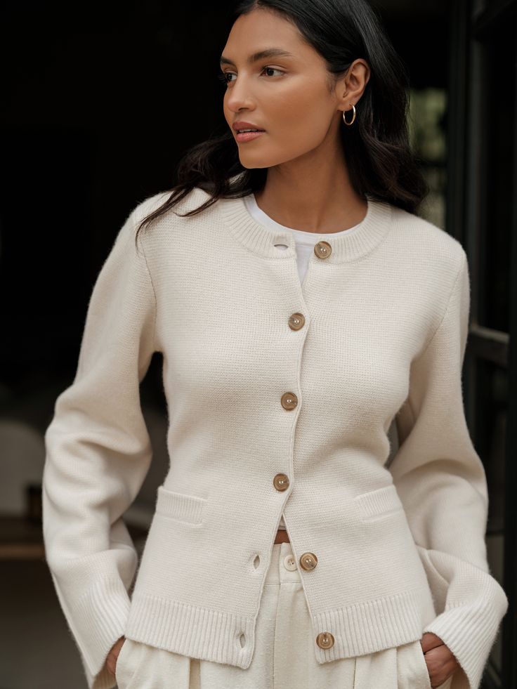 Elegant Cream Sweater For Fall, Classic Cream Cashmere Cardigan, Elegant Long-sleeved Wool Cardigan, Chic Beige Cashmere Sweater Coat, Classic Cream Cashmere Outerwear, Elegant Cashmere Sweater Coat For Fall, White Workwear Cardigan With Ribbed Cuffs, Timeless Wool Sweater For Fall, White Cashmere Cardigan With Ribbed Cuffs For Work