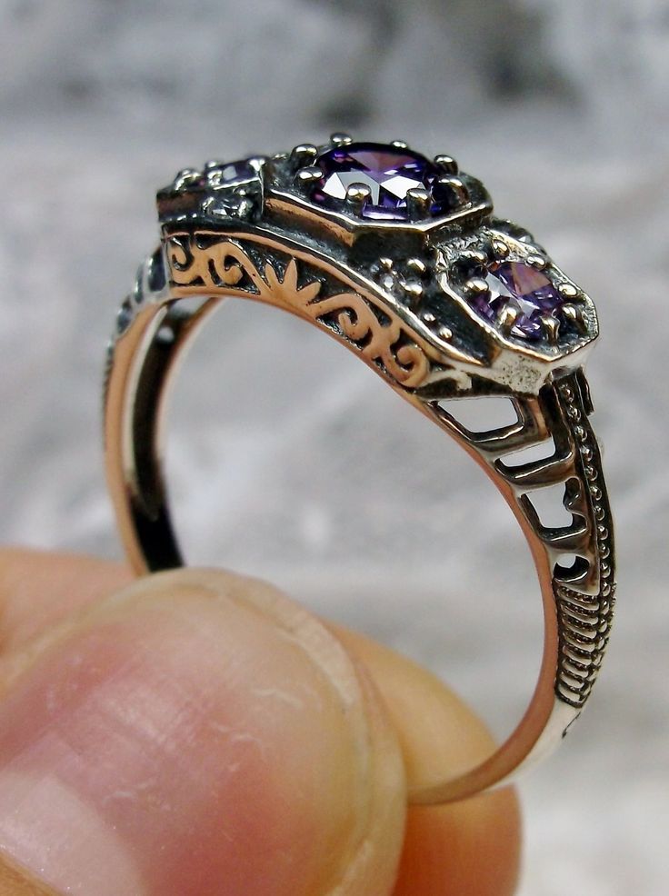 Art deco style ring with three Purple amethyst CZs set in sterling silver filigree Sterling Silver Amethyst Promise Ring With Intricate Design, Purple Amethyst Ring With Intricate Design For Promise, Purple Amethyst Promise Ring With Intricate Design, Purple Promise Ring With Intricate Design, Purple Intricate Design Promise Ring, Sterling Silver Amethyst Ring With Intricate Design, Purple Anniversary Rings With Intricate Design, Sterling Silver Amethyst Wedding Ring, Intricate Amethyst Ring In Sterling Silver