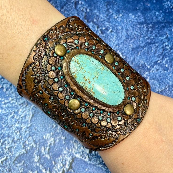 Southwestern Patina Bangle Jewelry, Southwestern Style Patina Bangle Jewelry, Southwestern Style Bangle With Patina, Southwestern Bangle With Patina, Adjustable Brown Jewelry With Patina, Southwestern Patina Bangle, Bohemian Engraved Turquoise Bracelets, Adjustable Brown Patina Jewelry, Engraved Turquoise Bohemian Bracelets