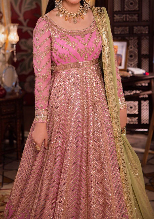 Introducing our New collection 'Chandni Raatein' by Asim Jofa designed to make you look and feel your best. Transformed into a living petal, this pink ensemble is a fairytale garden in bloom. The embroidered Peshwas, a delicate flower unfurling, is adorned with a cascade of light gold dewdrop-like sequins, coupled with 5mm and 9mm gold sequins amidst the intricate amalgam of gold zari and beige threads, weaving a glittering path guiding the gaze gently toward a blooming pink rose. The green embroidered dupatta, a verdant oasis, concludes this dreamlike story with a flourish. Embroidered Front Bodice on Chiffon Embroidered Back Bodice on Chiffon Embroidered Border for Front and Back Neckline, Bodice Hem and Armhole on Chiffon Embroidered Kalis for Peshwas on Chiffon Embroidered Border for H Chiffon Anarkali, Velvet Anarkali, Punjabi Boutique, Fairytale Garden, Batik Print Dress, Indian Anarkali, Salwar Suits Party Wear, Lehenga Jewellery, Georgette Anarkali