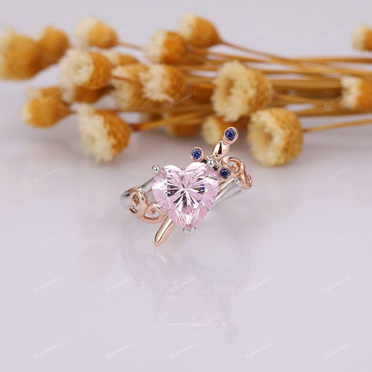 ※ Metal Type: Solid 14k Two Tone Gold; ※ Center Stone: Pink Simulated Diamond ※ Center Carat Weight: Heart Cut 3ct (9x9mm); ※ Side Stones/Accents: Created Blue Sapphire ※ SKU: ESR0635; ※ Accessories: *Shipped with beautiful ring box; *Directly price from Manufacturer, 1/3 the price from Jewelry Store; ※ Buy with Warranty: 1) 15 Days Money Back Guarantee; 2) Excellent Customer Service; 3) Free Shipping and insurance to WORLDWIDE; 4) Free Gift Box. ※ Contact Us if you need any of our service: 1) R White Gold Rings For Valentine's Day Birthday, White Gold Rings For Birthday And Valentine's Day, Heart Cut Diamond Rings For Mother's Day, Pink Heart Ring With Vvs Clarity For Valentine's Day, Heart Cut Birthstone Ring With Prong Setting, Heart Shaped Sapphire Wedding Ring, Heart Shaped Gemstone Rings For Mother's Day, Valentine's Day White Gold Heart Ring With Accent Stones, Heart Shaped Rings With Accent Stones For Mother's Day