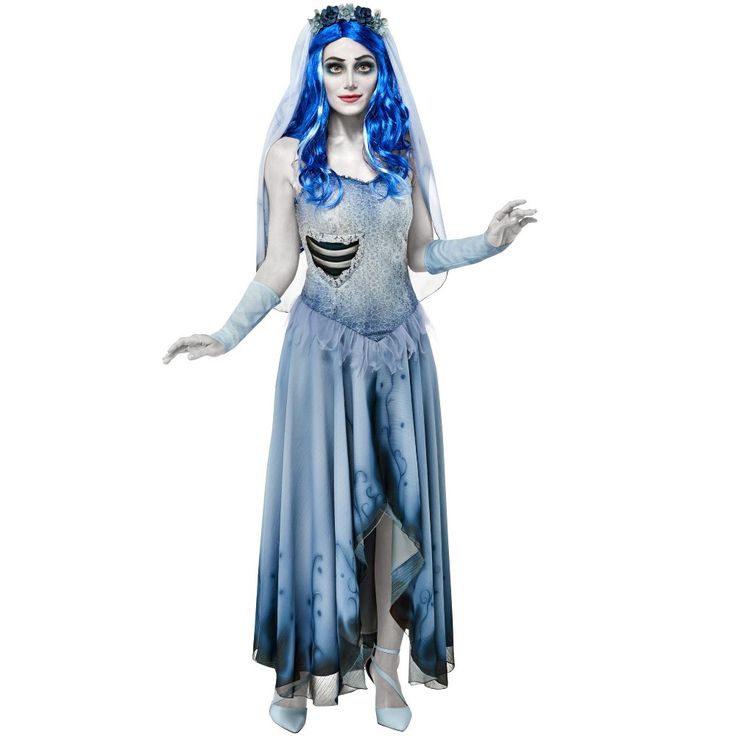 a woman dressed as corpse bride with blue hair and make - up is standing in front of a white background