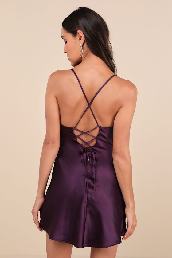 Feeling absolutely confident comes easy when you have a look like the Lulus Luxe Simplicity Dark Plum Satin Lace-Up Mini Dress! Sleek woven satin shapes this stunning dress that boasts a bustier-inspired bodice with pleated, lightly padded cups and a draping cowl neckline, supported by slender straps that create a lace-up design across the open back. The figure-skimming, A-line silhouette finishes at a flirty mini hem. Hidden back zipper/clasp. Fit: This garment fits true to size. Length: Mid-th Dark Purple Short Dress, Dark Purple Hoco Dress, Dark Purple Homecoming Dress, Dark Purple Mini Dress, Purple Hoco Dress, Purple Hoco, Satin Cowl Neck Dress, Mini Dress Satin, Purple Short Dress