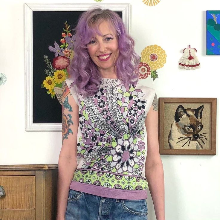 Vintage Flower Print Top, 1960s Lavender & Green Shirt, Sz S-M.  This is a super groovy top from the 1960s.  Double knit polyester top has a fantastic groovy flower power print with Brady Bunch vibes.  Super stretchy fabric and the design is vibrant and fun.  A pastel pink-purple color is mixed with bright lime green and black against a white background. Boxy cut with a zipper at the back of the neck (I forgot to zip it when I modeled this but the zipper does work). No tags. Measures like a modern small or fitted medium. Bust 35"-40", waist 34"-38", across shoulders 14.5", and 22" shoulder to hem. Flower Print Top, Brady Bunch, Vintage Flower Prints, Lavender Green, Double Knit, Green Shirt, Polyester Top, Print Top, Stretchy Fabric